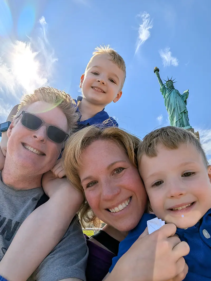 Tim Gabaree with Carrie, Clint, and Finn at the Statue of Liberty